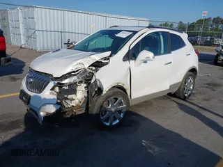 2016 Buick Encore Premium with VIN KL4CJDSB1GB647306, listed as a IAAI auction lot 41983159 with 59,592 mi miles. Bid and sale history available at carsss.com. Image 17.