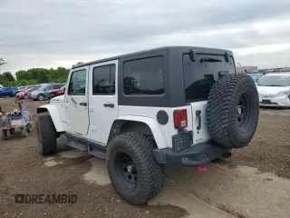 2016 Jeep Wrangler Unlimited Rubicon with VIN 1C4HJWFG9GL223928, listed as a Copart auction lot 58182125 with 57,711 mi miles and Salvage title. Bid and sale history available at DreamBid. Image 2.
