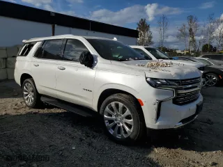 2022 Chevrolet Tahoe Premier with VIN 1GNSKSKD5NR100605, listed as a Copart auction lot 77857374 with 35,187 mi miles and Salvage Title. Bid and sale history available at carsss.com. Image 4.