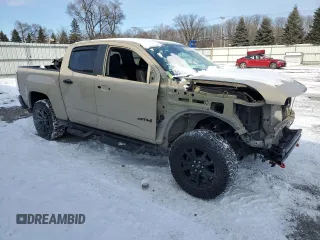 2021 GMC Canyon 4WD AT4 w/Leather with VIN 1GTG6FEN8M1279301, listed as a Copart auction lot 89373145 with 34,035 mi miles and Salvage Title. Bid and sale history available at carsss.com. Image 4.