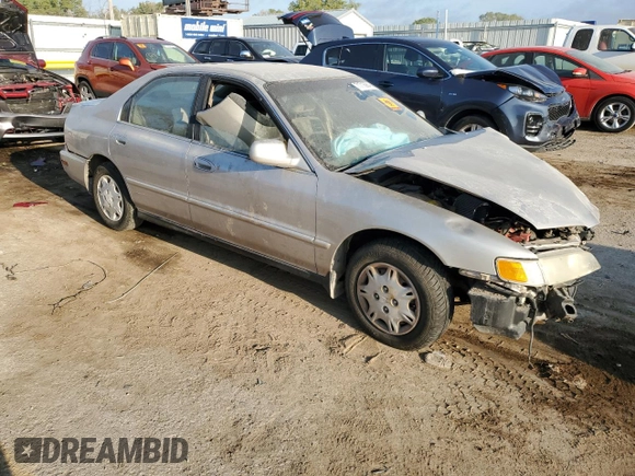 1997 Honda Accord Value with VIN 1HGCD5684VA168495, listed as a Copart auction lot 71716984 with 202,854 mi miles and Salvage Title. Bid and sale history available at DreamBid. Image 4.