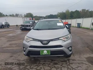 2018 Toyota RAV4 XLE with VIN 2T3WFREV3JW445654, listed as a IAAI auction lot 40849666 with 69,365 mi miles and . Bid and sale history available at DreamBid. Image 12.