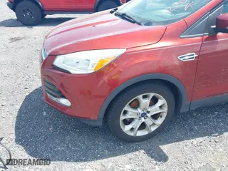 2015 Ford Escape Titanium with VIN 1FMCU0JX5FUB77475, listed as a IAAI auction lot 42103388 with 113,018 mi miles. Bid and sale history available at carsss.com. Image 6.