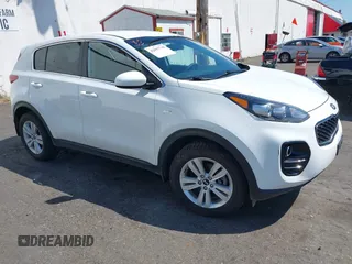 2018 Kia Sportage LX z VIN KNDPMCAC0J7387266, wystawiony jako IAAI lot #42097710 z przebiegiem 39 660 mil mil oraz . Historia ofert i sprzedaży dostępna na DreamBid. Obrazek 1.