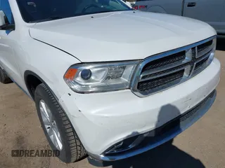 2019 Dodge Durango SXT Plus with VIN 1C4RDJAG8KC739065, listed as a IAAI auction lot 41888265 with 115,916 mi miles and . Bid and sale history available at DreamBid. Image 6.