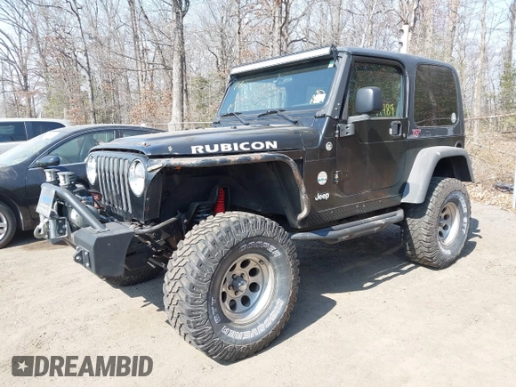 2004 Jeep Wrangler Rubicon with VIN 1J4FA69S64P789308, listed as a IAAI auction lot 41714489 with 186,302 mi miles. Bid and sale history available at carsss.com. Image 2.