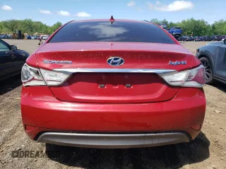 2012 Hyundai Sonata Hybrid z VIN KMHEC4A44CA039593, wystawiony jako Copart lot #55979085 z przebiegiem 128 168 mil mil oraz Czysty tytuł • Clean title. Historia ofert i sprzedaży dostępna na DreamBid. Obrazek 6.
