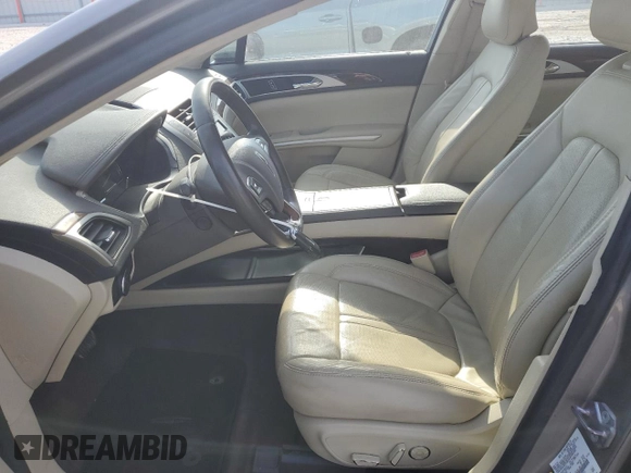 2015 Lincoln MKZ Hybrid with VIN 3LN6L2LU0FR621254, listed as a Copart auction lot 55275185 with 104,021 mi miles and Salvage Title. Bid and sale history available at DreamBid. Image 7.