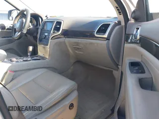 2011 Jeep Grand Cherokee Laredo z VIN 1J4RR4GG2BC511289, wystawiony jako IAAI lot #41240075 z przebiegiem 88 140 mil mil oraz . Historia ofert i sprzedaży dostępna na DreamBid. Obrazek 5.