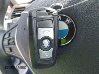 2014 BMW 3 Series 328i with VIN WBA3C1C52EK111076, listed as a IAAI auction lot 41817471 with 98,759 mi miles. Bid and sale history available at carsss.com. Image 11.