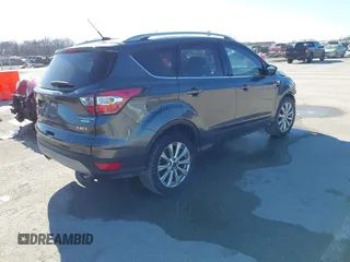 2017 Ford Escape Titanium with VIN 1FMCU0J92HUA26226, listed as a IAAI auction lot 41423259 with 111,076 mi miles. Bid and sale history available at carsss.com. Image 4.