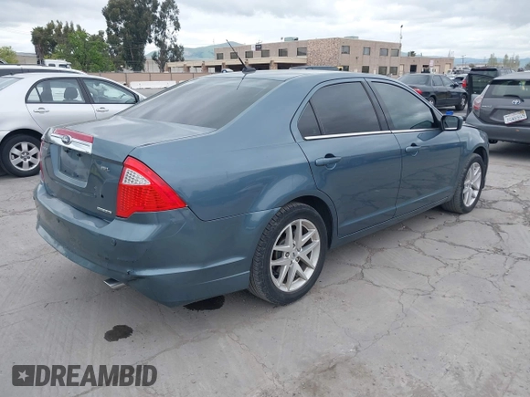 2012 Ford Fusion SEL with VIN 3FAHP0JG5CR409020, listed as a IAAI auction lot 42074553 with 90,962 mi miles. Bid and sale history available at carsss.com. Image 4.