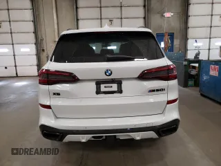 2020 BMW X5 M50i with VIN 5UXJU4C00L9C27198, listed as a Copart auction lot 76705264 with 0 mi miles and Salvage Title. Bid and sale history available at carsss.com. Image 6.
