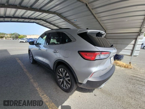 2020 Ford Escape Titanium Hybrid z VIN 1FMCU0DZ3LUB82649, wystawiony jako IAAI lot #42621618 z przebiegiem 46 265 mil mil oraz . Historia ofert i sprzedaży dostępna na DreamBid. Obrazek 7.