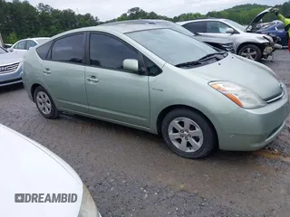 2007 Toyota Prius z VIN JTDKB20U077602951, wystawiony jako IAAI lot #42384098 z przebiegiem 169 136 mil mil oraz . Historia ofert i sprzedaży dostępna na DreamBid. Obrazek 1.