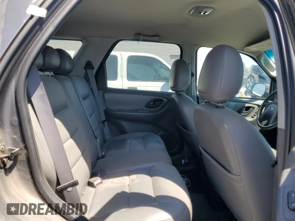 2005 Ford Escape XLT z VIN 1FMYU03155KB11291, wystawiony jako Copart lot #52246495 z przebiegiem Nie podano mil oraz Szkoda całkowita • Salvage title. Historia ofert i sprzedaży dostępna na DreamBid. Obrazek 10.
