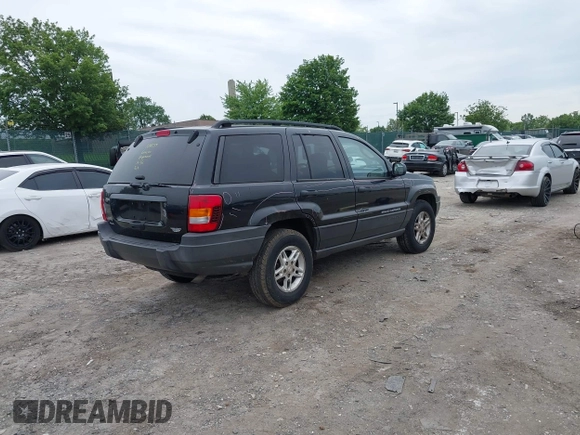 2004 Jeep Grand Cherokee Laredo z VIN 1J4GW48S54C198115, wystawiony jako IAAI lot #42351240 z przebiegiem 189 416 mil mil oraz . Historia ofert i sprzedaży dostępna na DreamBid. Obrazek 4.
