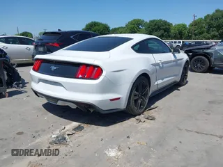 2016 Ford Mustang EcoBoost with VIN 1FA6P8TH0G5336238, listed as a IAAI auction lot 41975946 with 71,523 mi miles and . Bid and sale history available at DreamBid. Image 4.