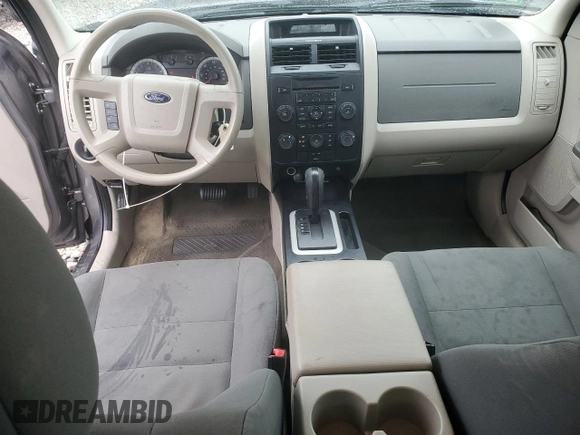 2009 Ford Escape XLS z VIN 1FMCU02799KC31553, wystawiony jako Copart lot #55219775 z przebiegiem 109 154 mil mil oraz Szkoda całkowita • Salvage title. Historia ofert i sprzedaży dostępna na DreamBid. Obrazek 8.