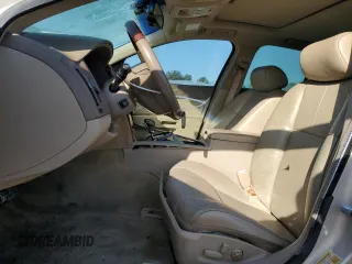 2007 Cadillac STS z VIN 1G6DW677970151227, wystawiony jako Copart lot #52345265 z przebiegiem 154 790 mil mil oraz Szkoda całkowita • Salvage title. Historia ofert i sprzedaży dostępna na DreamBid. Obrazek 7.