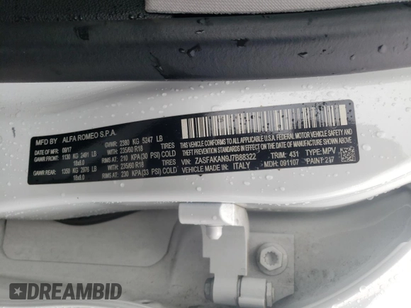 2018 Alfa Romeo Stelvio z VIN ZASFAKAN9J7B88322, wystawiony jako Copart lot #48808605 z przebiegiem 87 096 mil mil oraz Szkody całkowita. Historia ofert i sprzedaży dostępna na DreamBid. Obrazek 14.