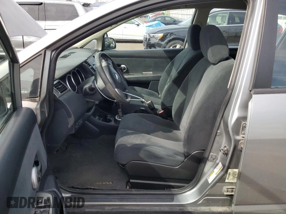 2012 Nissan Versa S with VIN 3N1BC1CPXCL360725, listed as a Copart auction lot 49407865 with 134,875 mi miles and Salvage Title. Bid and sale history available at carsss.com. Image 7.