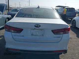2016 Kia Optima SX Turbo with VIN 5XXGW4L2XGG043934, listed as a IAAI auction lot 40451940 with 86,386 mi miles and . Bid and sale history available at carsss.com. Image 16.