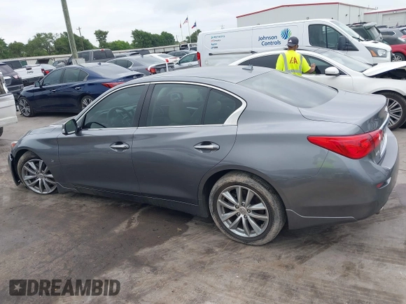 2015 Infiniti Q50 Premium z VIN JN1BV7AR7FM408015, wystawiony jako IAAI lot #42083301 z przebiegiem 58 817 mil mil oraz . Historia ofert i sprzedaży dostępna na DreamBid. Obrazek 14.