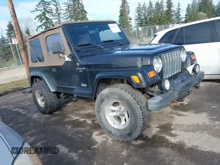 1999 Jeep Wrangler Sahara with VIN 1J4FY49S9XP410760, listed as a IAAI auction lot 41647187 with 181,353 mi miles. Bid and sale history available at carsss.com. Image 1.