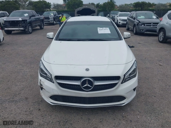 2019 Mercedes-Benz CLA with VIN WDDSJ4EB8KN749874, listed as a IAAI auction lot 41653051 with 56,286 mi miles. Bid and sale history available at carsss.com. Image 12.