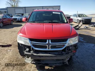 2014 Dodge Journey SXT z VIN 3C4PDCBG3ET270963, wystawiony jako Copart lot #49604915 z przebiegiem 138 187 mil mil oraz Szkoda całkowita • Salvage title. Historia ofert i sprzedaży dostępna na DreamBid. Obrazek 5.