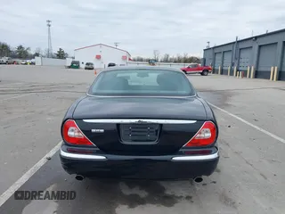 2004 Jaguar XJ with VIN SAJWA71C14SG20122, listed as a IAAI auction lot 41685767 with 113,392 mi miles. Bid and sale history available at carsss.com. Image 17.