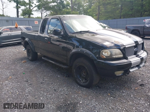 2001 Ford F-150 XLT z VIN 1FTRW08L91KE74815, wystawiony jako IAAI lot #42679387 z przebiegiem 201 258 mil mil oraz . Historia ofert i sprzedaży dostępna na DreamBid. Obrazek 1.