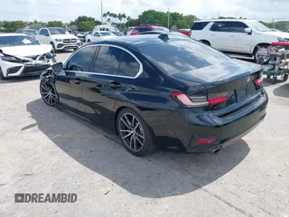 2021 BMW 3 Series 330i with VIN 3MW5R1J09M8B93600, listed as a IAAI auction lot 41735270 with 77,648 mi miles. Bid and sale history available at carsss.com. Image 3.