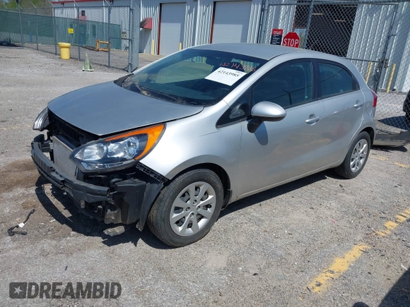 2013 Kia Rio LX with VIN KNADM5A33D6307061, listed as a IAAI auction lot 42143985 with 66,621 mi miles and . Bid and sale history available at DreamBid. Image 2.