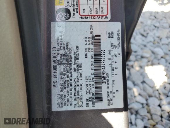 2012 Ford Fusion SE with VIN 3FAHP0HA1CR235996, listed as a Copart auction lot 61243025 with 165,218 mi miles and Salvage title. Bid and sale history available at DreamBid. Image 12.