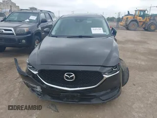 2017 Mazda CX-5 Touring with VIN JM3KFACL1H0222889, listed as a IAAI auction lot 41913789 with 153,321 mi miles. Bid and sale history available at carsss.com. Image 13.