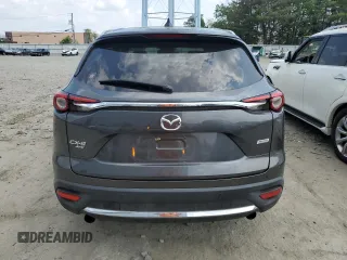2018 Mazda CX-9 Grand Touring z VIN JM3TCBDY9J0208533, wystawiony jako Copart lot #59854635 z przebiegiem 90 263 mil mil oraz Szkoda całkowita • Salvage title. Historia ofert i sprzedaży dostępna na DreamBid. Obrazek 6.