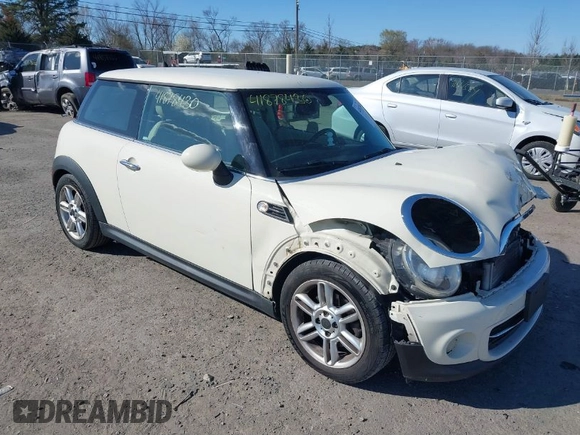 2012 MINI Hardtop with VIN WMWSU3C59CT255588, listed as a IAAI auction lot 41878430 with 103,033 mi miles and . Bid and sale history available at DreamBid. Image 1.