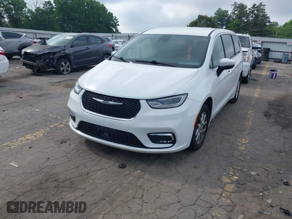 2023 Chrysler Pacifica Touring L with VIN 2C4RC1BG8PR535446, listed as a IAAI auction lot 42307923 with 65,718 mi miles and . Bid and sale history available at DreamBid. Image 17.