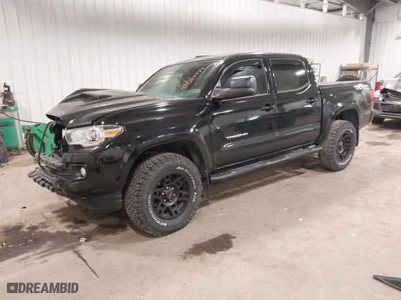 2016 Toyota Tacoma SR with VIN 3TMCZ5AN5GM027471, listed as a IAAI auction lot 41054774 with 74,864 mi miles. Bid and sale history available at carsss.com. Image 17.