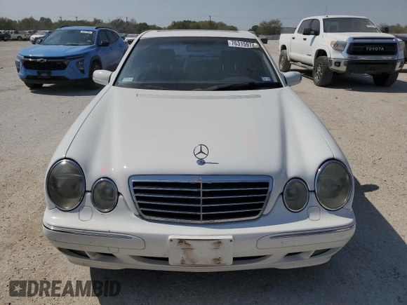 2000 Mercedes-Benz E-Class with VIN WDBJF65J5YB054237, listed as a Copart auction lot 76315974 with 95,092 mi miles and Salvage Title. Bid and sale history available at carsss.com. Image 5.