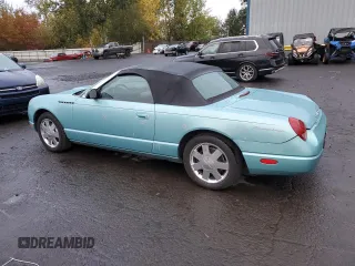 2002 Ford Thunderbird Hardtop Premium with VIN 1FAHP60A02Y121714, listed as a Copart auction lot 77852994 with 132,049 mi miles and Salvage Title. Bid and sale history available at DreamBid. Image 2.
