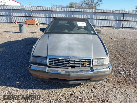 1992 Cadillac Seville z VIN 1G6EL13B2N0612154, wystawiony jako IAAI lot #41757101 z przebiegiem Nie podano mil oraz . Historia ofert i sprzedaży dostępna na DreamBid. Obrazek 14.