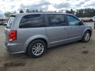 2014 Dodge Grand Caravan SXT with VIN 2C4RDGCG7ER141867, listed as a Copart auction lot 53187715 with 231,414 mi miles and Clean Title. Bid and sale history available at DreamBid. Image 3.