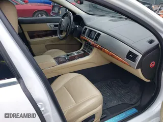 2014 Jaguar XF V6 SC with VIN SAJWJ0EF9E8U32052, listed as a IAAI auction lot 41542500 with 74,550 mi miles. Bid and sale history available at carsss.com. Image 5.