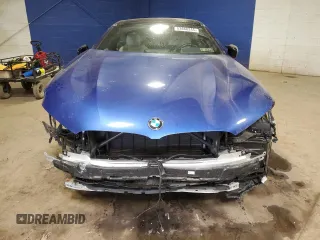 2024 BMW 8 Series M850i z VIN WBAGV8C07RCP90030, wystawiony jako Copart lot #53668245 z przebiegiem Nie podano mil oraz Szkody całkowita. Historia ofert i sprzedaży dostępna na DreamBid. Obrazek 5.