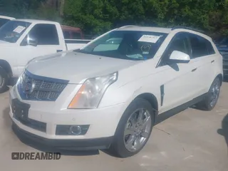 2011 Cadillac SRX Premium Collection z VIN 3GYFNCEYXBS579760, wystawiony jako IAAI lot #42238707 z przebiegiem Nie podano mil oraz . Historia ofert i sprzedaży dostępna na DreamBid. Obrazek 17.