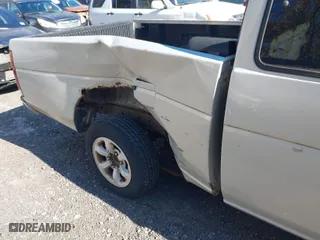 1997 Nissan Trucks 2WD XE with VIN 1N6SD16S2VC304896, listed as a IAAI auction lot 41685274 with 70,695 mi miles. Bid and sale history available at carsss.com. Image 6.