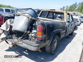 2002 Chevrolet Silverado 1500HD LT z VIN 1GCGC13U42F238816, wystawiony jako IAAI lot #42031587 z przebiegiem Nie podano mil oraz . Historia ofert i sprzedaży dostępna na DreamBid. Obrazek 4.